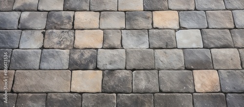 Analyze the square s paving slabs Context Paving slabs background and stone texture