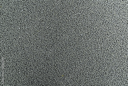 Photo background texture of gunpowder for loading cartridges on a rifles. photo