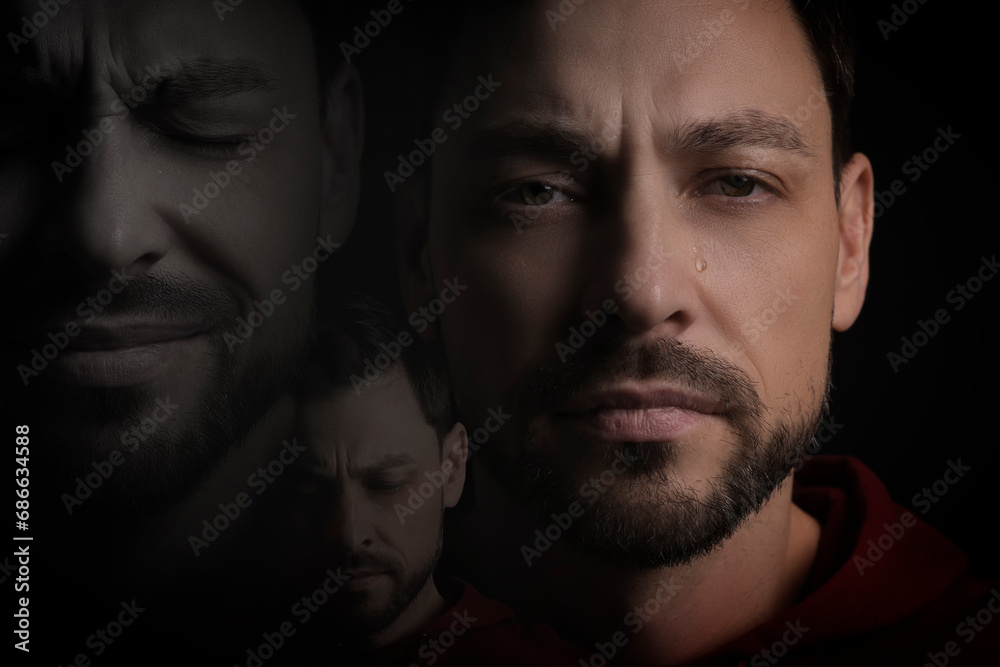 Man suffering from mental illness on black background. Dissociative identity disorder Man suffering from mental illness on black background. Dissociative identity disorder