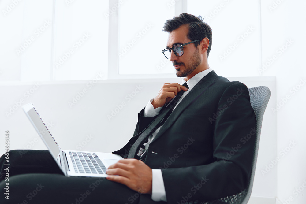 Business man young businessman victory technology job winner chair executive office laptop happy Business man young businessman victory technology job winner chair executive office laptop happy