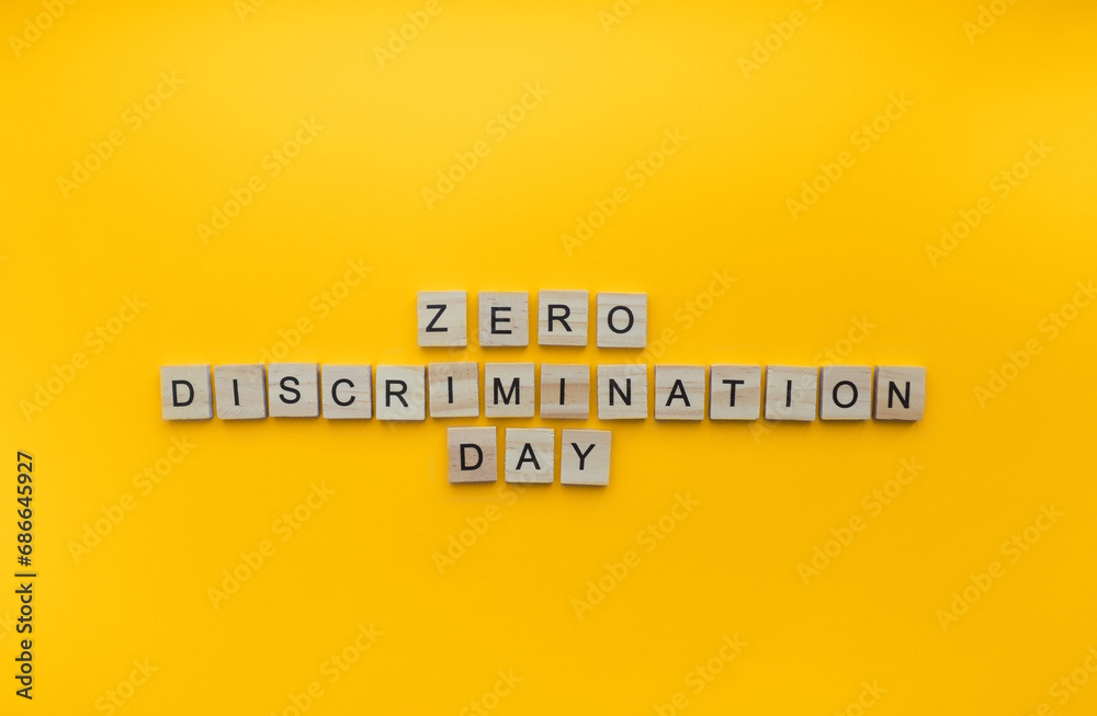 Fototapeta premium March 1, Zero Discrimination Day, a minimalistic banner with an inscription in wooden letters