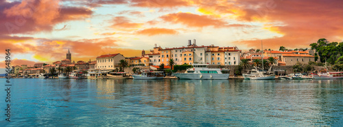 Beautiful Island Rab in Croatia. Townscape panorama over sunset. popular tourist destination photo