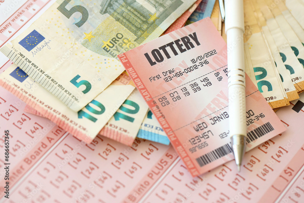 Lottery ticket and gambling receipt on table with pen and European Union euro money bills close up Lottery ticket and gambling receipt on table with pen and European Union euro money bills close up