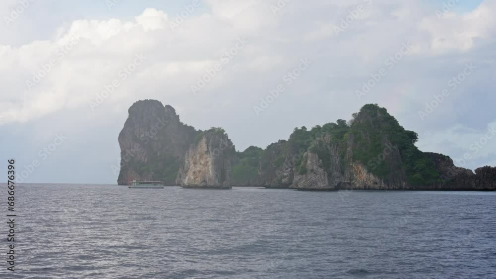 an island oasis in the heart of the Andaman Sea. this tranquil haven reveals lush greenery and sandy shores, inviting exploration enchantment of Thailand's tropical paradise. High quality 4k footage an island oasis in the heart of the Andaman Sea. this tranquil haven reveals lush greenery and sandy shores, inviting exploration enchantment of Thailand's tropical paradise. High quality 4k footage