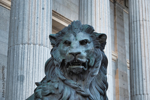 close-up of a lion from the Palacio de las Cortes in Madrid photo