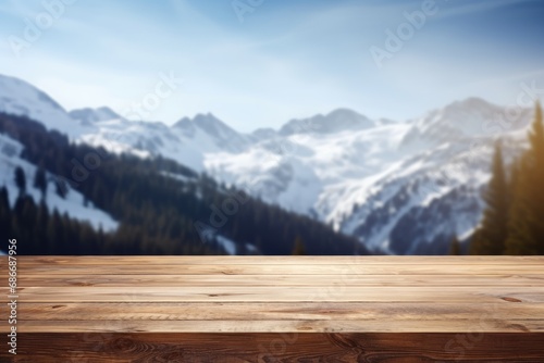 The empty wooden table top with blur mountain background