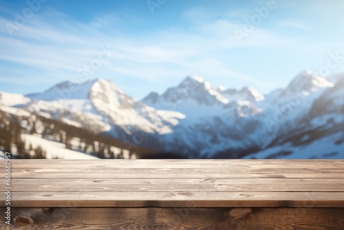 The empty wooden table top with blur mountain background