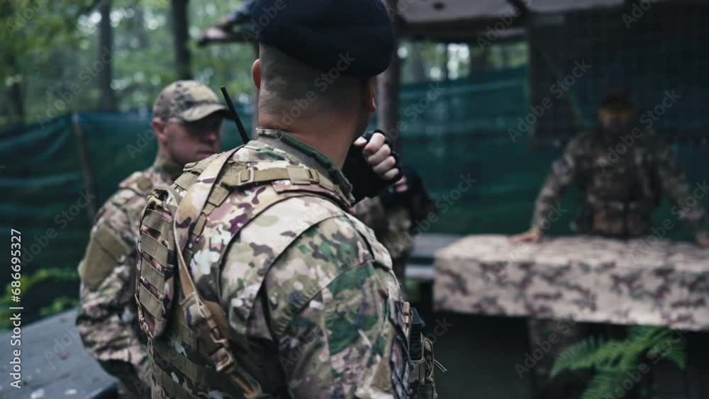 Military Commander Issuing Orders to the Soldiers in the Forest Camp Military Commander Issuing Orders to the Soldiers in the Forest Camp