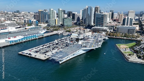 Aircraft Carrier At San Diego In California United States. Famous Coast City. Harbor Island. Aircraft Carrier At San Diego In California United States. 