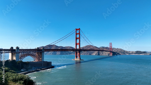 Golden Gate Bridge At San Francisco In California United States. Megalopolis Downtown Cityscape. Business Travel. Golden Gate Bridge At San Francisco In California United States.  © ByDroneVideos