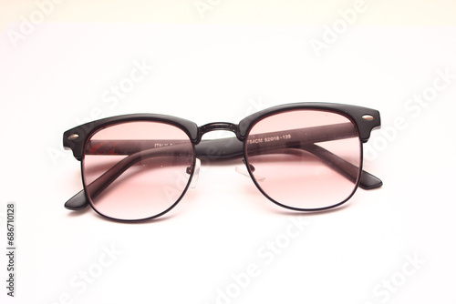 women's sunglasses with brown glass isolated on a white background, accessory