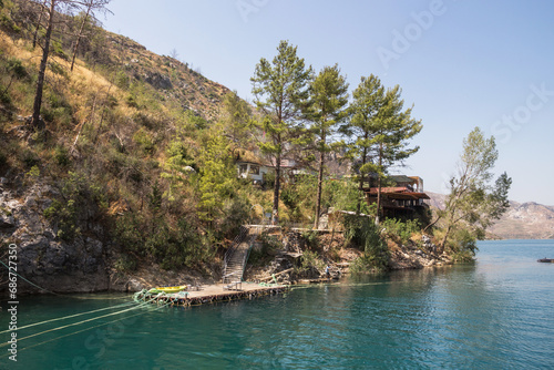 Restaurant on a hill in Green Canyon. Green Canyon in Turkey, the city of Manavgat. Artificial lake-reservoir. Excursions to the Green Canyon.