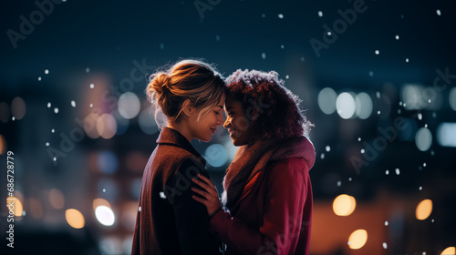 Two women sharing a romantic moment on a city rooftop at night, happy LGBT couple, Valentine’s Day, bokeh, with copy space