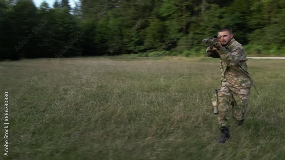 Drone Moving Alongisde a Soldier Who's Running With a Sniper Drone Moving Alongisde a Soldier Who's Running With a Sniper