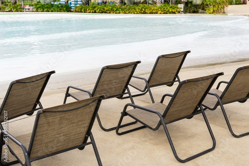 sun loungers by the pool in the water park