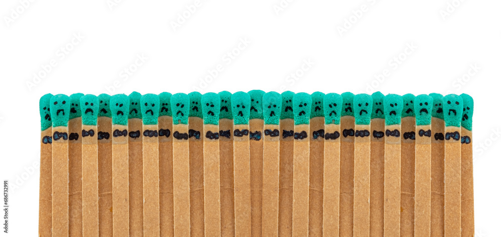 matchsticks with faces painted on the heads on white background