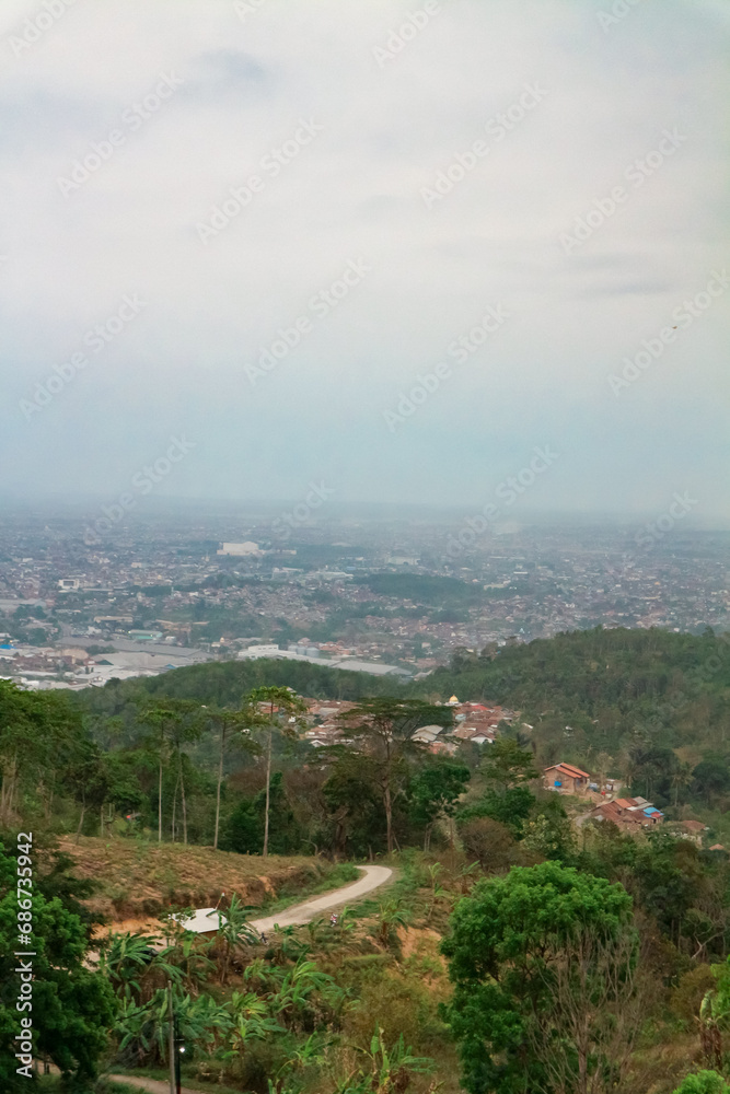 View of the city from the mountain in the afternoon