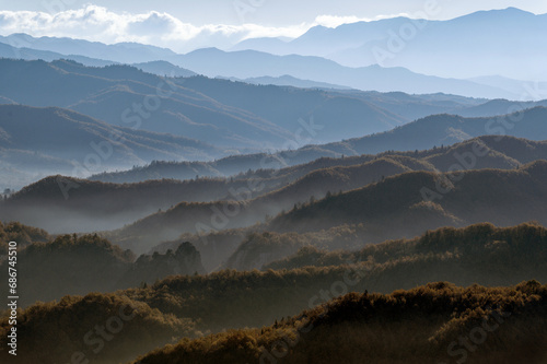 Panoramic mountain landscape of Zagori with morning mist and Autumn colours in Epirus  Greece