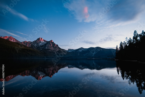 Twilight view of the Sawtooth Range reflected on Sawtooth Lake; Idaho, United States of America