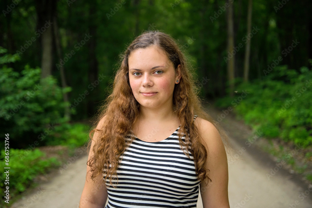 Outdoor portrait of a teenager girl; Walker, Minnesota, United States of America
