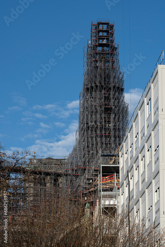 Paris, France - 11 30 2023: Notre Dame de Paris. Panoramic view of the renovation site with scaffolding and the new steeple.
