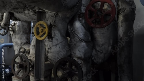 Valve hand wheels on steam pipeline