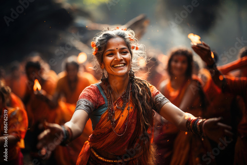 A joyful woman dancing in a traditional Indian festival with a happy crowd and vibrant colors all around. photo