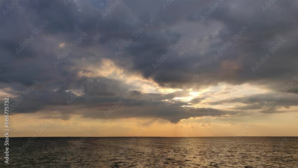 Sunset with clouds over the sea. Dramatic sunset over the sea. Romantic sunset Sunset with clouds over the sea. Dramatic sunset over the sea. Romantic sunset