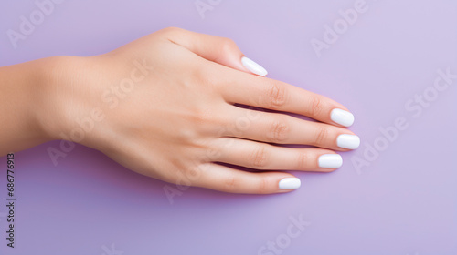 woman hand with perfect skin and natural manicure, finger nails care