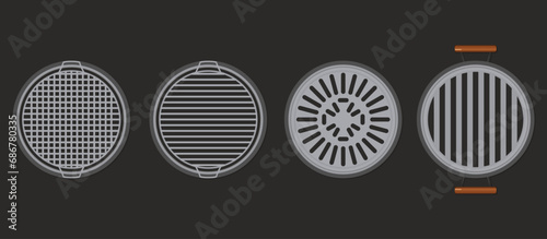 Top view of four round grill grills on black background. Build in layers For easy adjustment and separation. photo