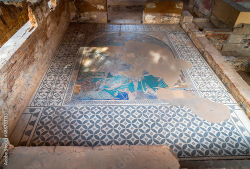 Remains of the cosmological or cosmogonic mosaic of.cosmic painting with personifications of nature:.Ocean-river: Crustacean pincers, Kethos-headed sea wyrm and harpoon in the Mitreo house in Merida. photo