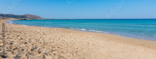 Fototapeta Naklejka Na Ścianę i Meble -  Banner View of the sea in the Island with sandy beach, cloudless and clear water. Tropical colours, peace and tranquillity. Turquoise sea. Falasarna beach, Crete island, Greece.