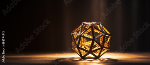 Illuminated dodecahedron made with 3D printing Copy space image Place for adding text or design photo