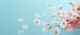 Lovely flowers floating on blue conveying spring love and celebration Copy space image Place for adding text or design