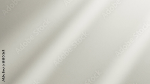 empty plaster wall with soft texture and sunlight, wall with soft shadows and light, empty wall for background and design, white-cream empty abstract blank space