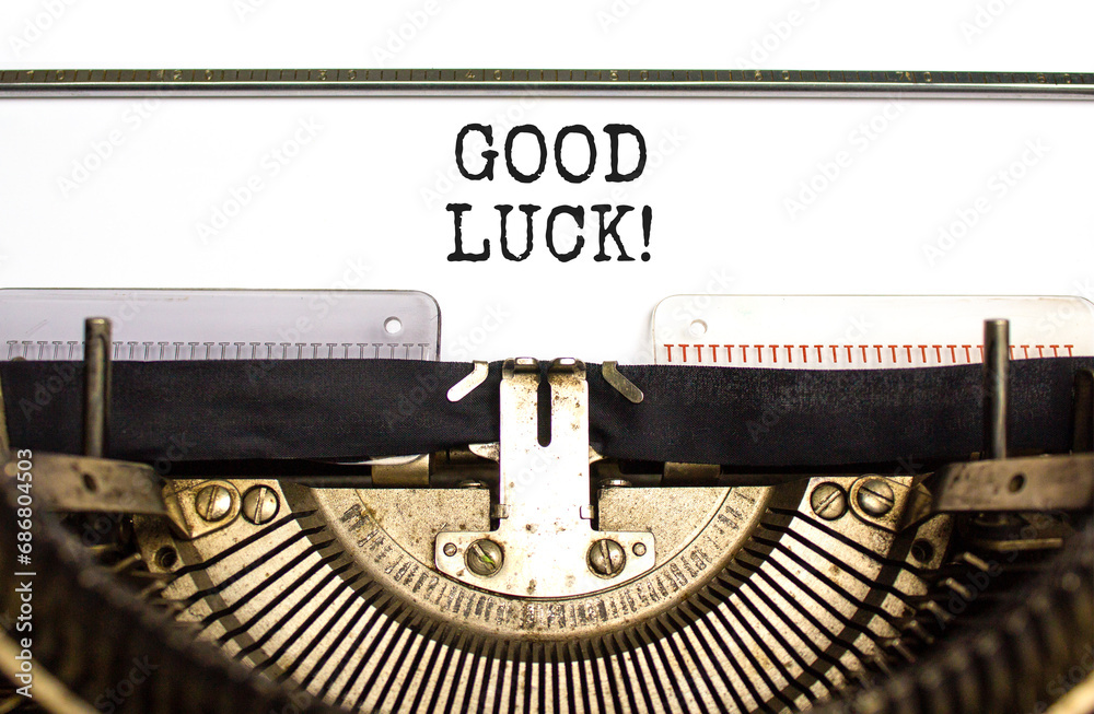Good luck symbol. Concept words Good luck typed on beautiful old retro typewriter. Beautiful white paper background. Business, motivational good luck concept. Copy space.