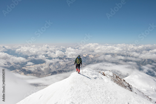 Russia, Upper Baksan Valley, Caucasus, Mountaineer ascending Mount Elbrus