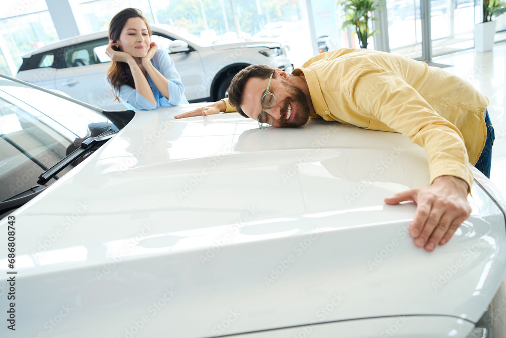 Fototapeta premium Photo of loving couple in car center
