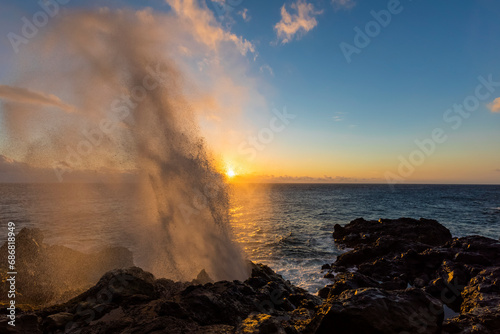 Reunion, West Coast, rocky coast at Souffleur, water fountain at sunset