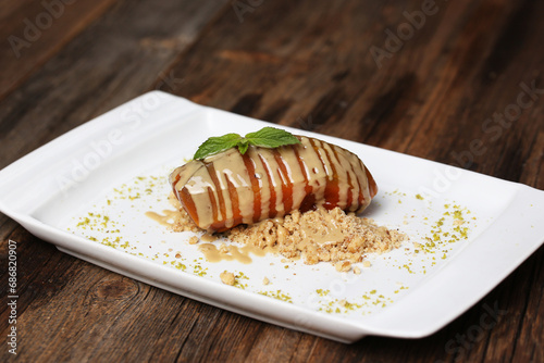 Pumpkin dessert with tahini and hazelnuts