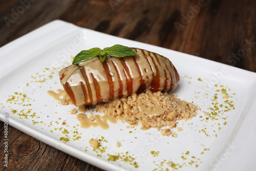 Pumpkin dessert with tahini and hazelnuts