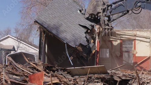 Abandoned house being demolished
