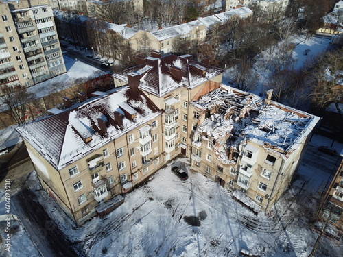 A drone view of a house destroyed by a Russian kamikaze drone in the city of Sumy, Ukraine. The Shahed military drone crashed into a residential building in Ukraine. Dilapidated house.