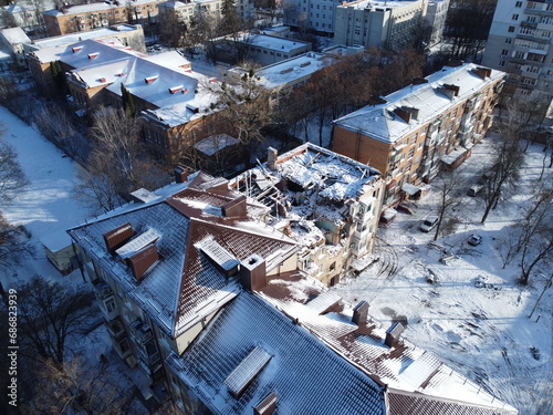 A drone view of a house destroyed by a Russian kamikaze drone in the city of Sumy, Ukraine. The Shahed military drone crashed into a residential building in Ukraine. Dilapidated house.