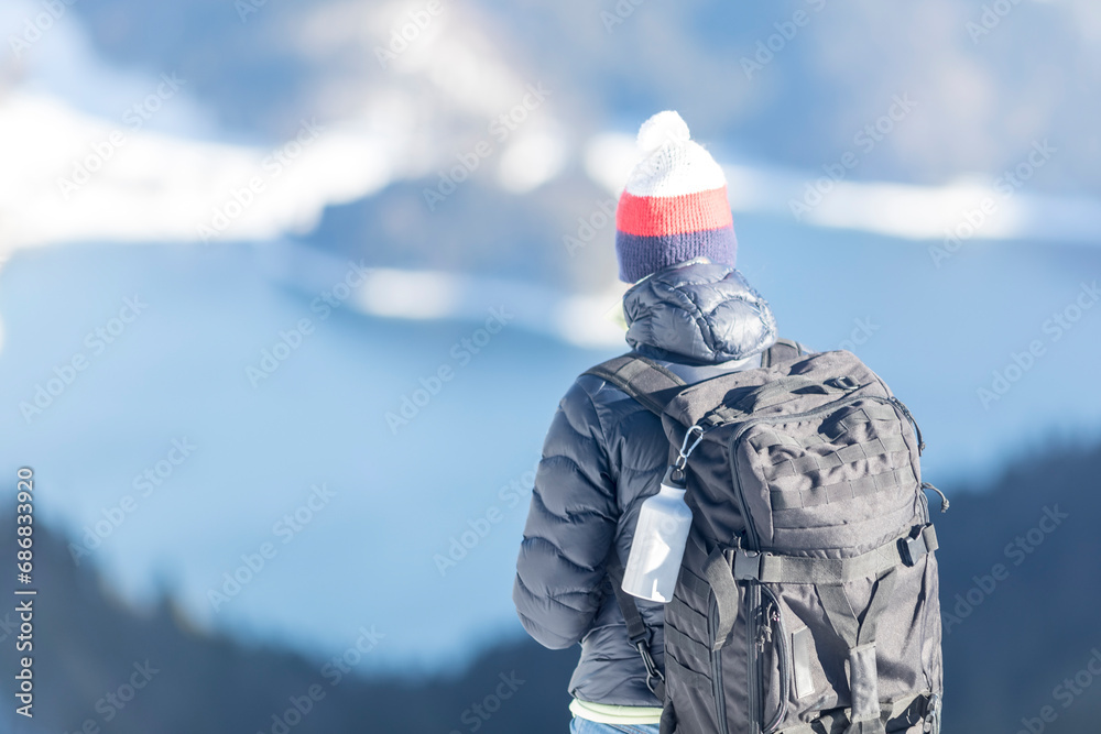 Germany, Bavaria, Alps, hiker with backpack at Lake Walchen