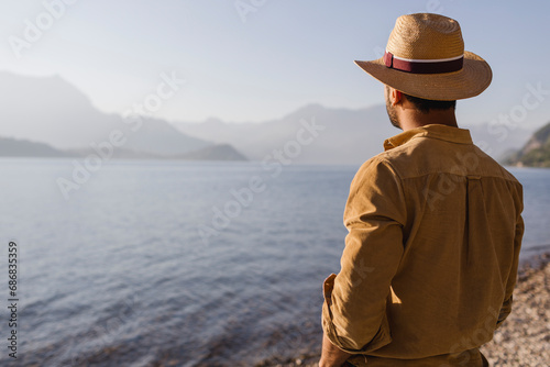 Italy, Lierna, back view of man looking at lake © tunedin