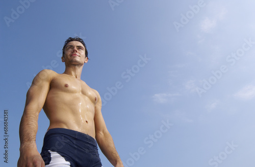Man in Swimming Trunks photo