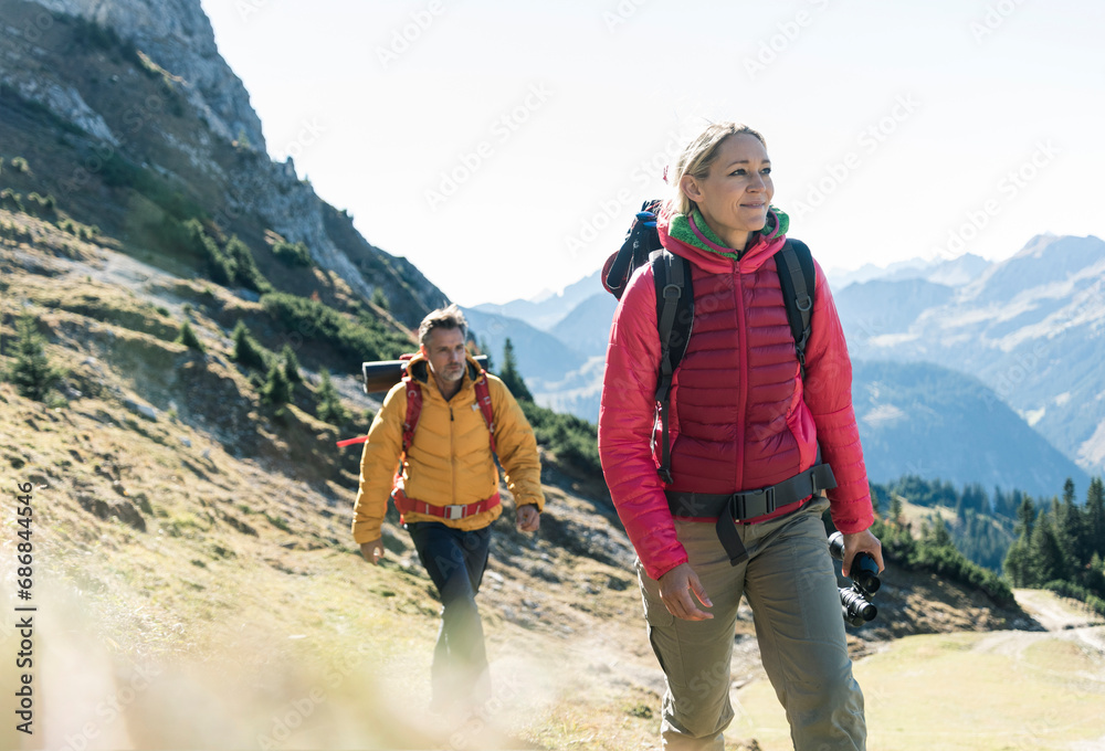Austria, Tyrol, couple hiking in the mountains