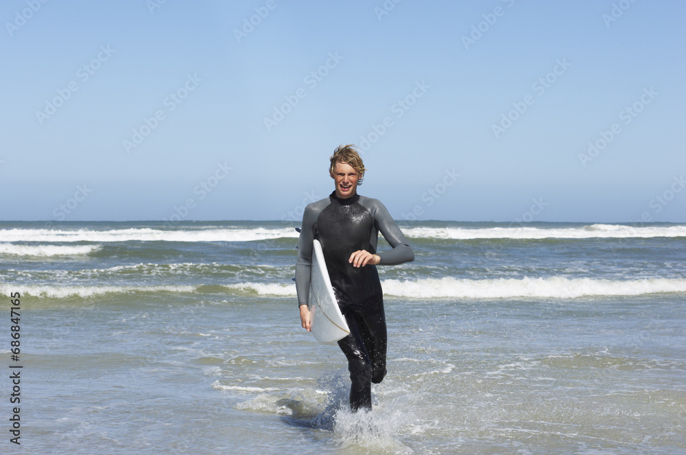 Surfer At The Beach