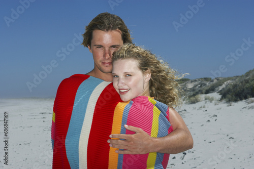 Young Couple On The Beach